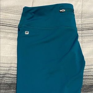 FABLETICS TEAL LEGGINGS SIZE MEDIUM